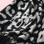 Monogrammed Leopard Pom Pom scarf detail shot