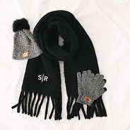 black oversized scarf with gloves and hat flatlay