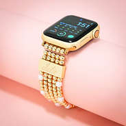 beaded pearl watch band on pink background