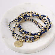 Navy gameday bracelet stack on tray