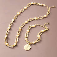 gold pearl starburst necklace with bracelet