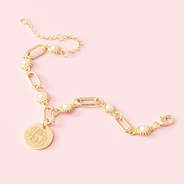 monogrammed gold pearl starburst bracelet