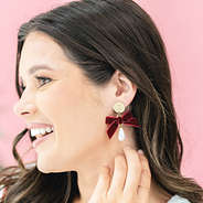 monogrammed velvet bow earrings on peyton