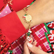 christmas charm bracelet on wrist
