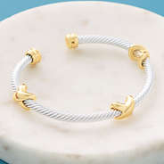 silver and gold cable bangle