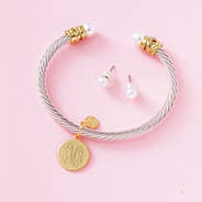 pearl cable bracelet & earring set on pink background