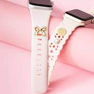 gold monogrammed bow smartwatch charms pinned on watch