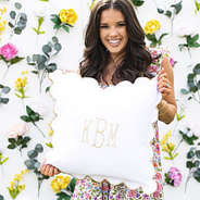 khaki scalloped pillow sham in hands