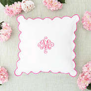 pink scalloped pillow sham flatlay