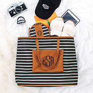 Monogrammed Overnight Tote Bag on White Sheet