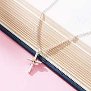 cable cross necklace detail shot