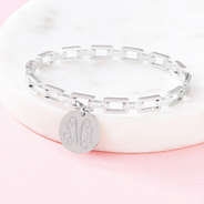 silver pave chainlink bangle on marble dish