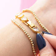 gold rhinestone heart bracelet up close