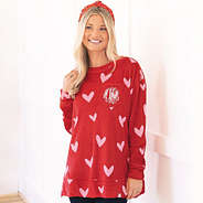 girl wearing monogrammed softspun hearts sweatshirt in red hot hearts
