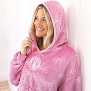close up of girl wearing personalized pink bow xl blanket hoodie
