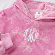close up of pink bows xl blanket hoodies monogram