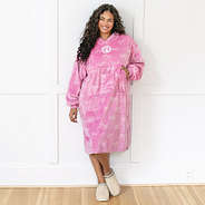 girl wearing monogrammed extra large blanket hoodie in pink bows