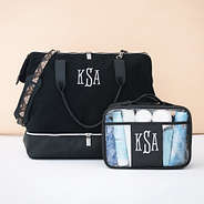 black clear monogrammed toiletry bag with black mosaic canvas weekender