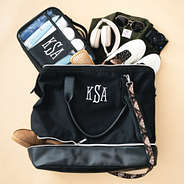 black mosaic monorammed canvas weekend bag packed with shoe compartment