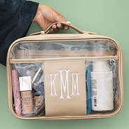 personalized large clear toiletry case in gold packed