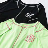 black and lime athleisure layering tee detail shot