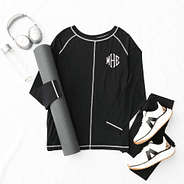 black athleisure layering tee flatlay