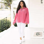 girl wearing monogrammed puff sleeve fleece pullover in pink