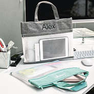 monogrammed reusable storage bag in charcoal and mint in office