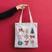 holding up christmas bag