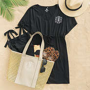 personalized cinch waist cover up in black outfit with straw tote