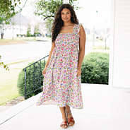 girl wearing smocked dress in flora trellis