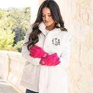 girl wearing hot pink monogrammed gloves