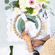 white scalloped napkin table setting