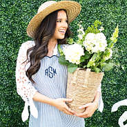 navy seersucker scalloped apron on peyton up close