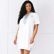girl wearing monogrammed seersucker accent cover up with fishtail monogram