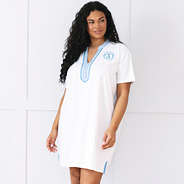 girl wearing monogrammed seersucker accent cover up