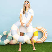 girl wearing personalized seersucker accent cover up