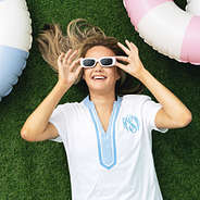 girl with sunglasses wearing monogrammed seersucker accent cover up