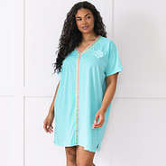 girl wearing ocean monogrammed accent cover up