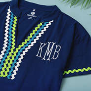 close up of monogrammed ric rac cover up