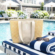 straw caning tote on chair at pool