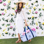 girl carrying personalized wire top extra large tote in blue shells