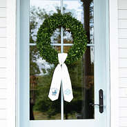 boy wreath sash on door