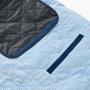 close up of personalized picnic blanket in navy seersucker