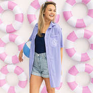 girl wearing lavender monogrammed fishing shirt with pool floaties