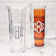clear and orange monogrammed acrylic pitcher with nesting cups