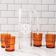 personalized acrylic pitcher with nesting cups in orange