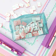 clear blue monogrammed mahjong tile bag on mahjong board