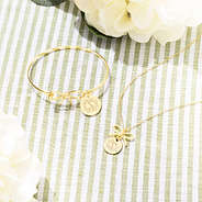 Gold bow necklace and bow bracelet