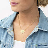gold heart pendant necklace on bella
